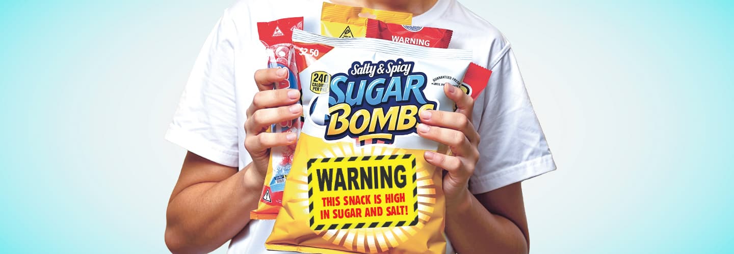 a person holding a bag of snacks that reads Salty and Spicy Sugar Bombs